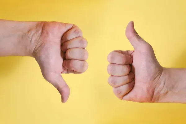 depositphotos_527237794-stock-photo-likes-dislikes-hand-gesture-young
